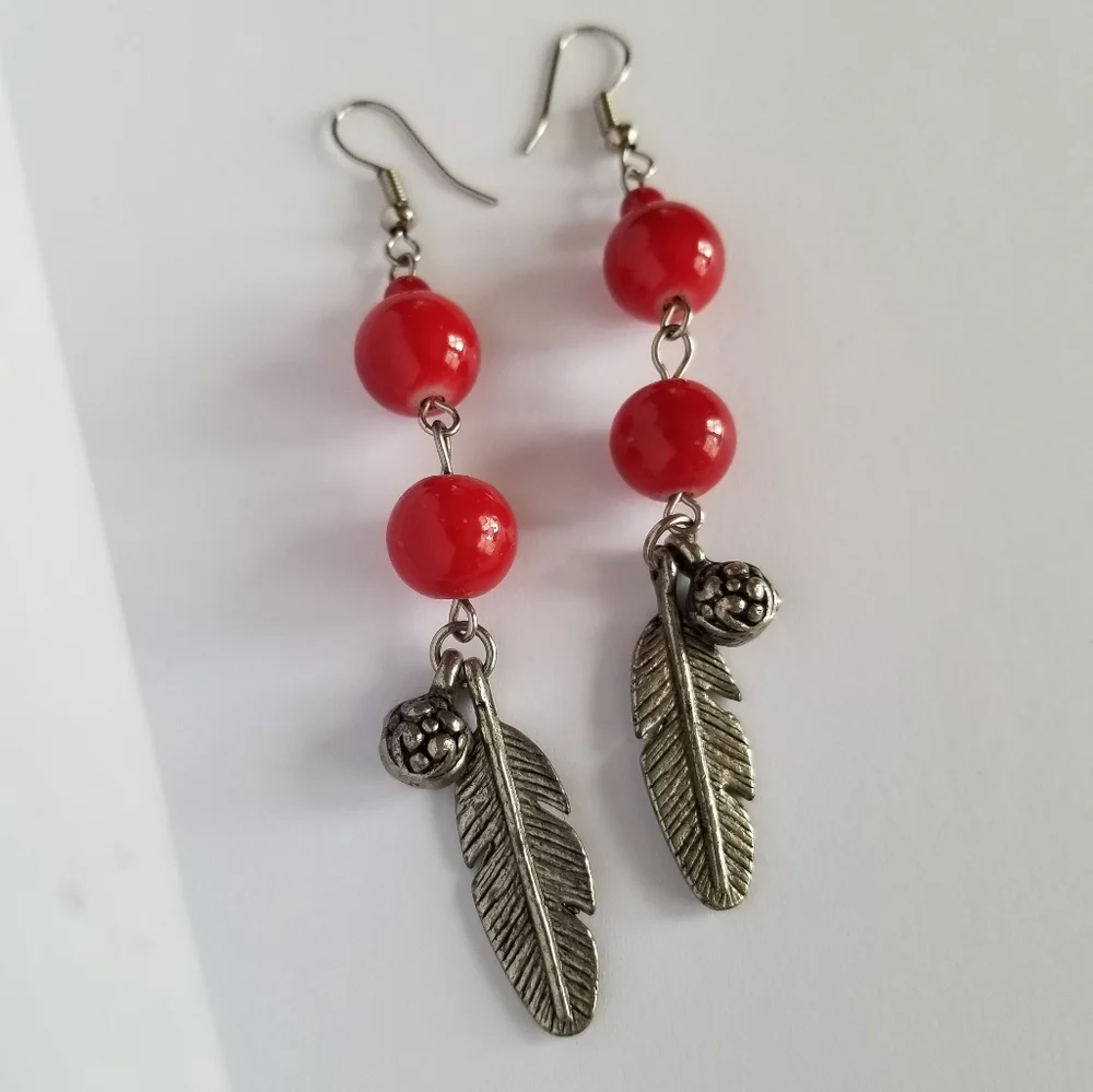 Feather earrings with red beads and flower ball beads silver tone boho
